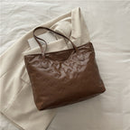 French Retro Simple Embossed Hand-carrying Big Shoulder Bag