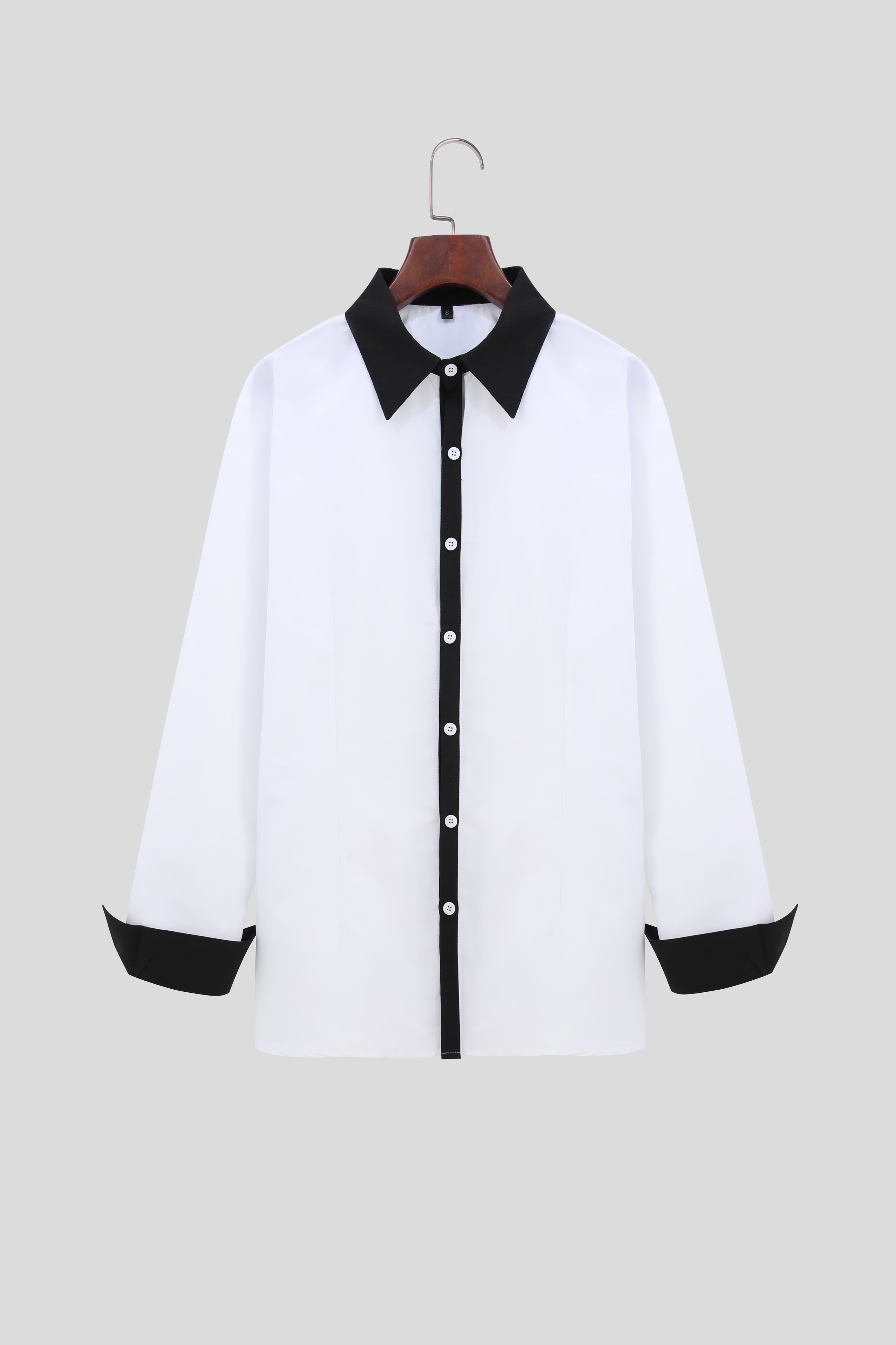 A Handsome Business And Fashionable Long-sleeved Shirt With Contrasting Colors For A Teenage Man